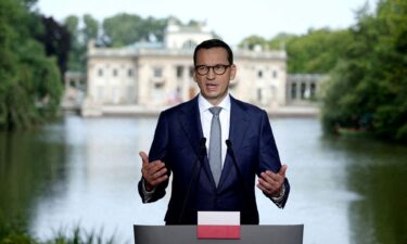 Polish Prime Minister Mateusz Morawiecki addresses a press conference in Warsaw on July 5.