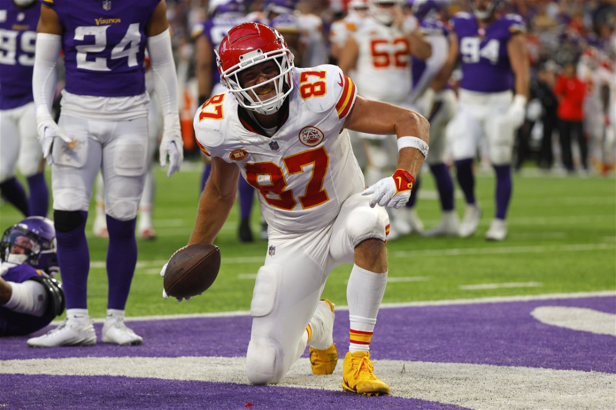 Kansas City Chiefs tight end Travis Kelce (87) celebrates after catching a 4-yard touchdown pass during the second half of an NFL football game against the Minnesota Vikings, Sunday, Oct. 8, 2023, in Minneapolis. 