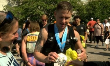 John Allison survived an IED blast while serving in Afghanistan in 2011 and a liver transplant in 2020. He participated in the Milwaukee Lakefront Marathon to help raise awareness for veteran suicide.
