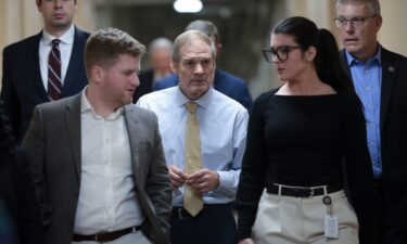 Rep. Jim Jordan boards an elevator in the U.S. Capitol following a House Republican conference meeting on October 12 in Washington