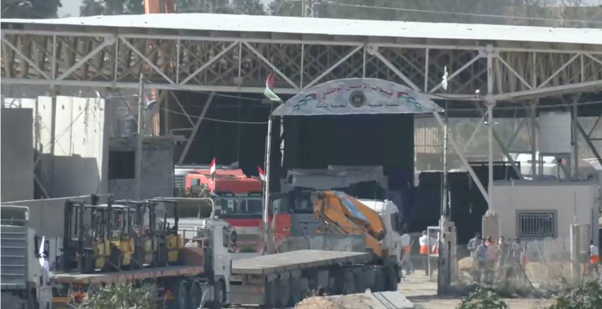 Trucks carrying aid wait to enter the Palestinian side of the border with Egypt, as the conflict between Israel and Palestinian Islamist group Hamas continues, as seen from Rafah in the southern Gaza Strip, in this still picture taken from a video October 21.
