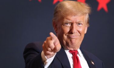 Former President Donald Trump arrives for a rally in Cedar Rapids