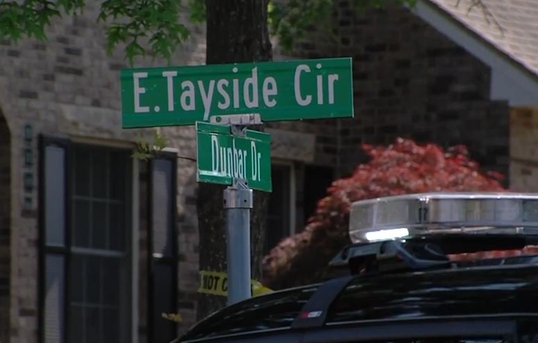 FILE -- Street signs outside the home where Janet Jago was shot in May 2023.