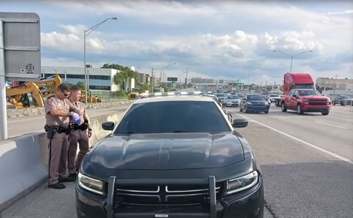 <i>FHP/WSVN</i><br/>A South Florida woman was arrested after she was caught driving a vehicle resembling a Florida Highway Patrol unit along the Palmetto Expressway in Medley.