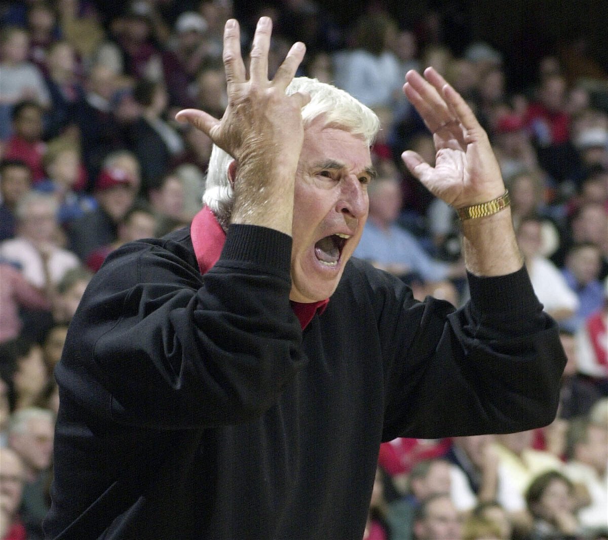 FILE - Texas Tech coach Bob Knight yells from the sidelines in the first half of a college basketball game against Houston, Dec. 14, 2001 in Houston. Bob Knight, the brilliant and combustible coach who won three NCAA titles at Indiana and for years was the scowling face of college basketball has died. He was 83. Knight's family made the announcement on social media Wednesday evening, Nov. 1, 2023. 
