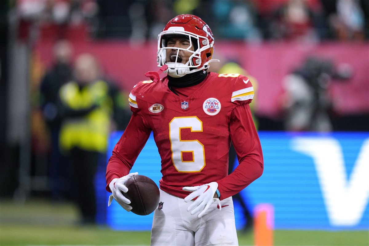 Kansas City Chiefs safety Bryan Cook celebrates after scoring on a fumble recovery by the Chiefs during the first half of an NFL football game against the Miami Dolphins Sunday, Nov. 5, 2023, in Frankfurt, Germany.