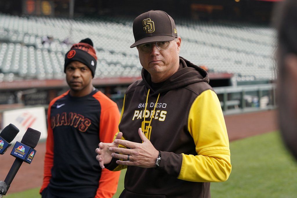 FILE - Then-San Diego Padres third base coach Mike Shildt, right, speaks at a news conference next to San Francisco Giants first base coach Antoan Richardson before a baseball game in San Francisco on April 13, 2022. Shildt has been hired as manager of the San Diego Padres, returning to the dugout two years after he was suddenly fired by the St. Louis Cardinals following a third straight playoff appearance, a person with knowledge of the situation said Tuesday, Nov. 21, 2023.