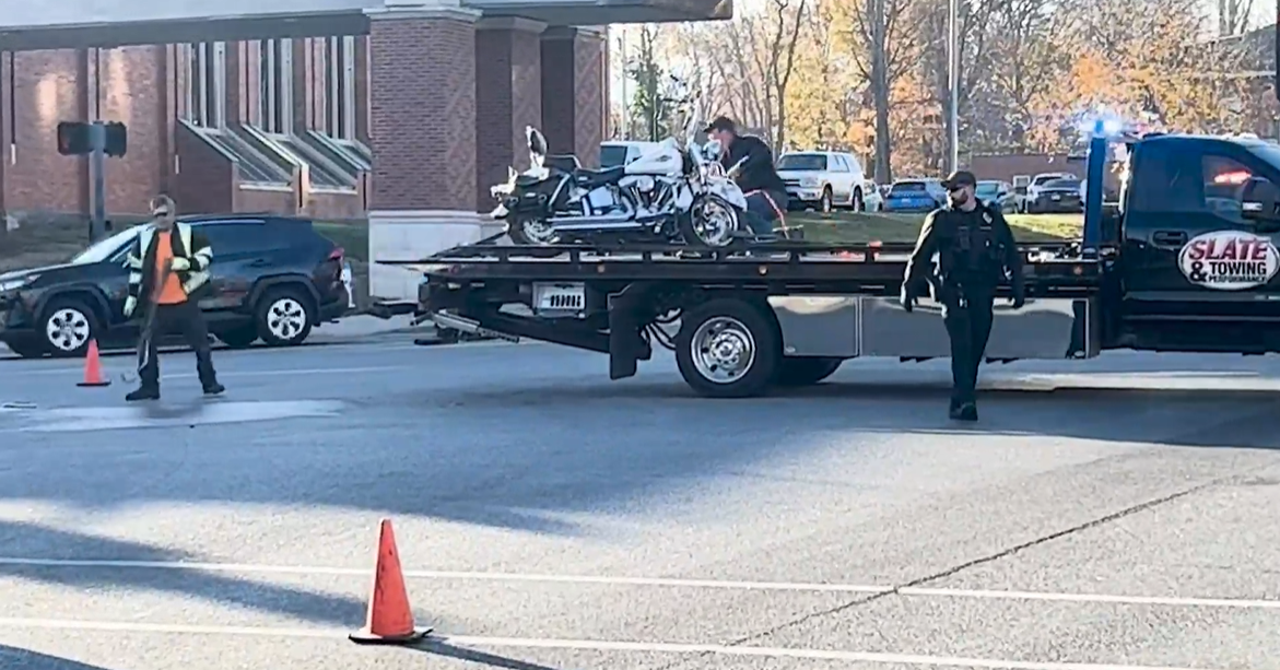 A motorcycle is towed away Monday after it was involved in a crash with a school bus, according to the Columbia Fire Department. One person was brought to an area hospital with 