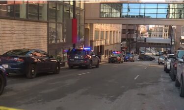 Police have revealed the cause of death for a child whose body was found in an alley mid-day Monday in downtown Kansas City.