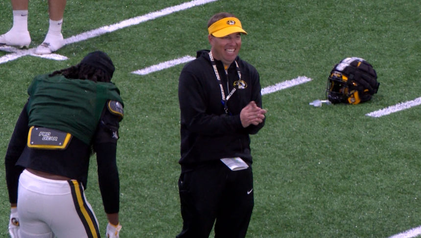Mizzou football coach Eli Drinkwitz laughed with players at practice ahead of the game against Georgia, on Saturday, Nov. 4, 2023. 
