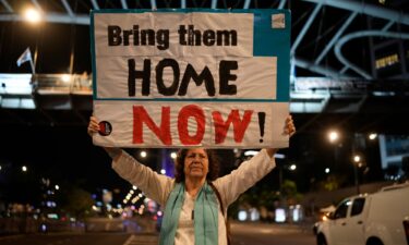 People demonstrate prior to any hostage announcements outside the Kirya defense complex as the political cabinet holds a meeting on November 21 in Tel Aviv