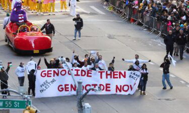 Pro-Palestinian protesters demonstrate during the 97th Macy's Thanksgiving Day Parade in New York City Thursday.