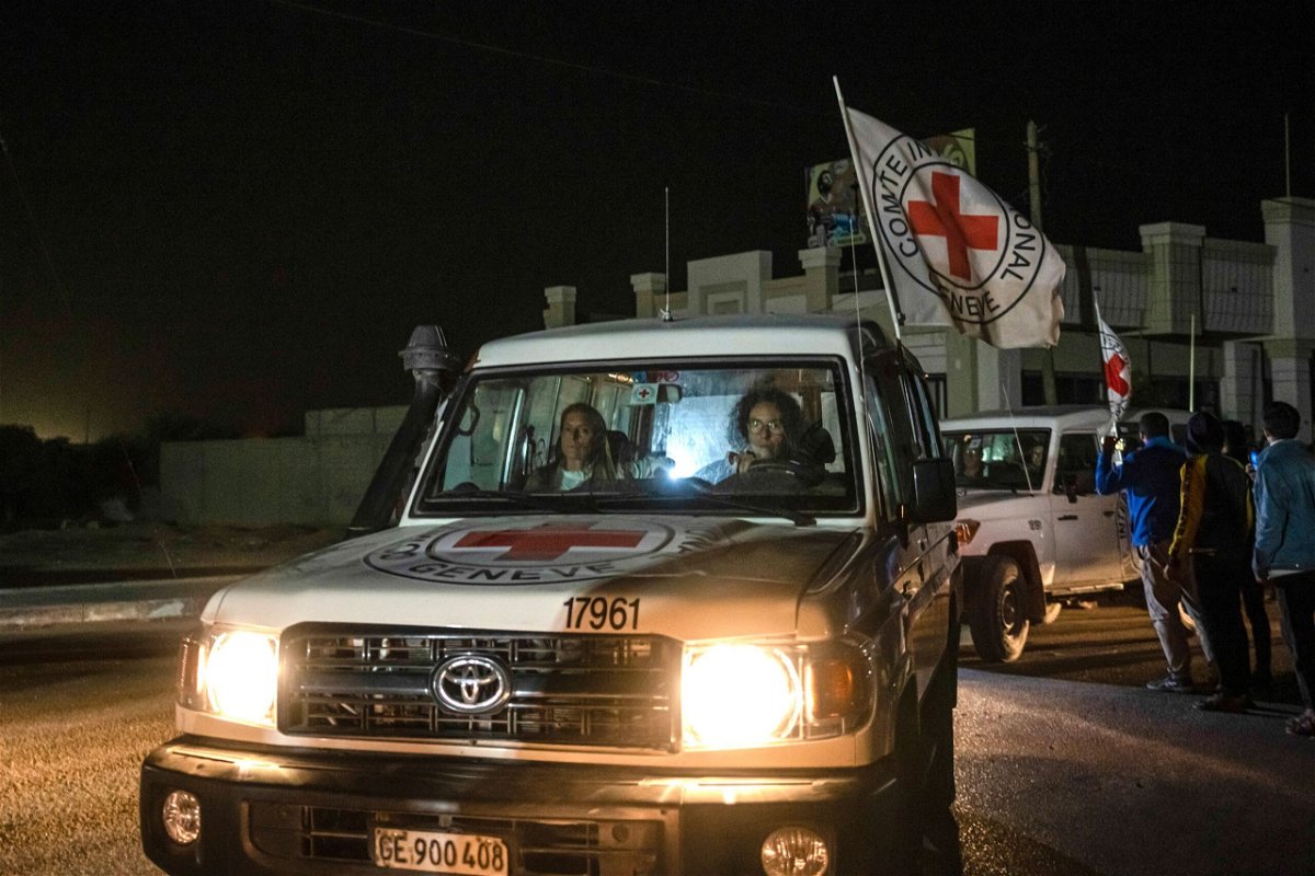 A Red Cross convoy carrying Israeli and foreign hostages heads to Egypt from the Gaza Strip on Sunday.
