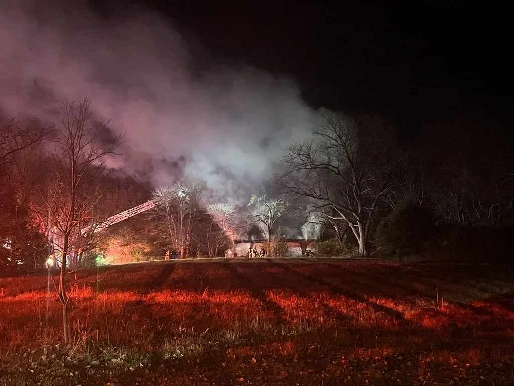 Firefighters battle a fire at a vacant house on Rock Quarry Road in Columbia on Friday, Nov. 4, 2023.