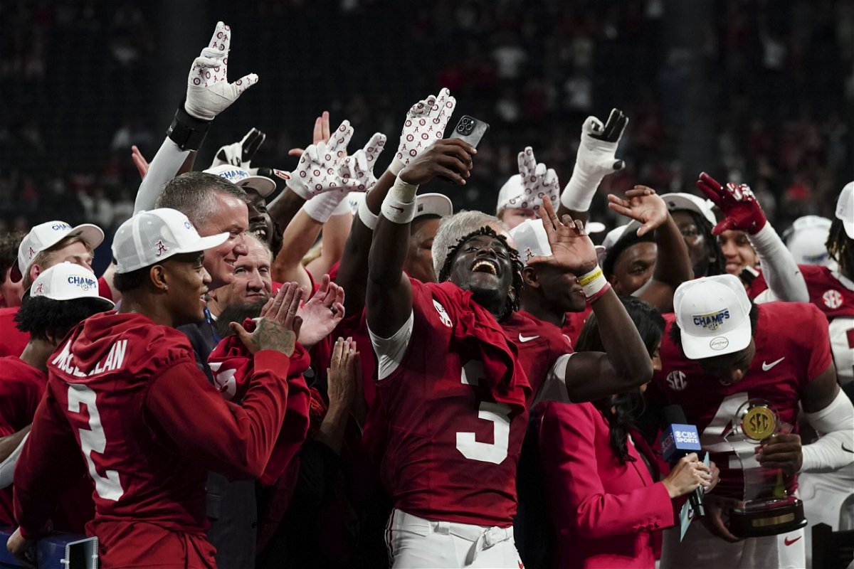 Alabama celebrates after a win against Georgia after the Southeastern Conference championship NCAA college football game in Atlanta, Saturday, Dec. 2, 2023. 