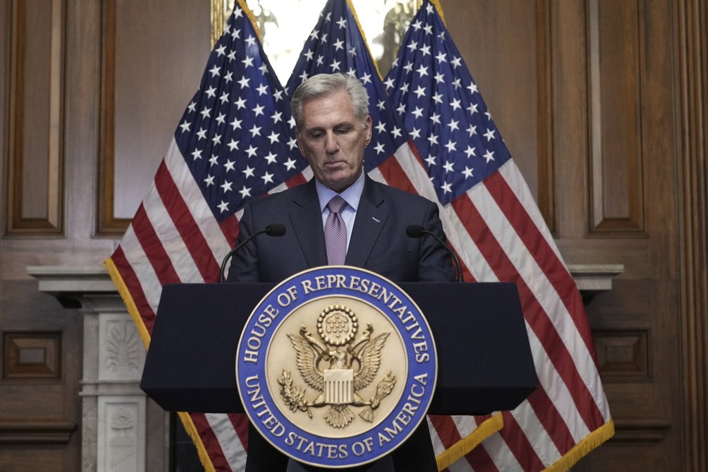 FILE - Rep. Kevin McCarthy, R-Calif., speaks to reporters hours after he was ousted as Speaker of the House, Tuesday, Oct. 3, 2023, at the Capitol in Washington. McCarthy says he's resigning from his congressional seat in California two months after his historic ouster as House speaker. 
