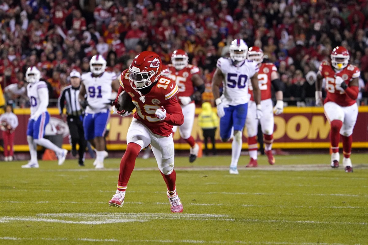 Kansas City Chiefs wide receiver Kadarius Toney runs to the end zone after catching a lateral by teammate Travis Kelce during the second half of an NFL football game against the Buffalo Bills Sunday, Dec. 10, 2023, in Kansas City, Mo. The play was nullified after Toney was called for being offside on the play. 