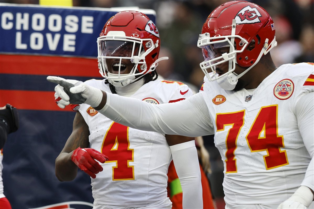Kansas City Chiefs wide receiver Rashee Rice (4) celebrates his touchdown with offensive tackle Jawaan Taylor (74) during the first half of an NFL football game against the New England Patriots, Sunday, Dec. 17, 2023, in Foxborough, Mass. 