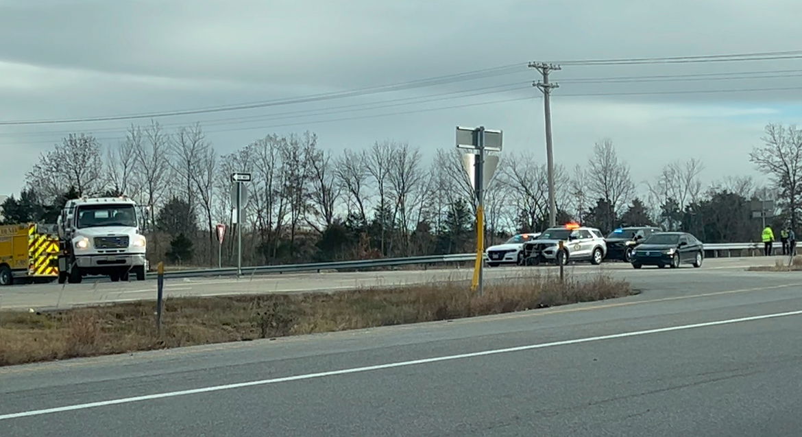 Sheriff's deputies linger at the scene of a crash at Highway 124 and Highway 63 in northern Boone County on Tuesday, Dec. 12, 2023.