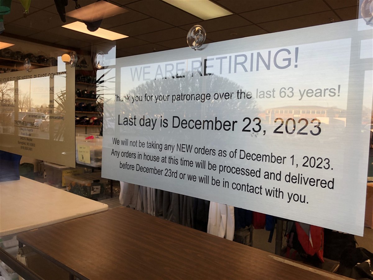 This sign in a window of Red Weir Athletic Supplies indicates that the store will be closing on Dec. 23.