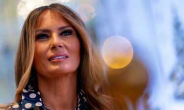 Former first lady Melania Trump listens as former President Donald Trump announces he is running for president for the third time as he speaks at Mar-a-Lago in Palm Beach