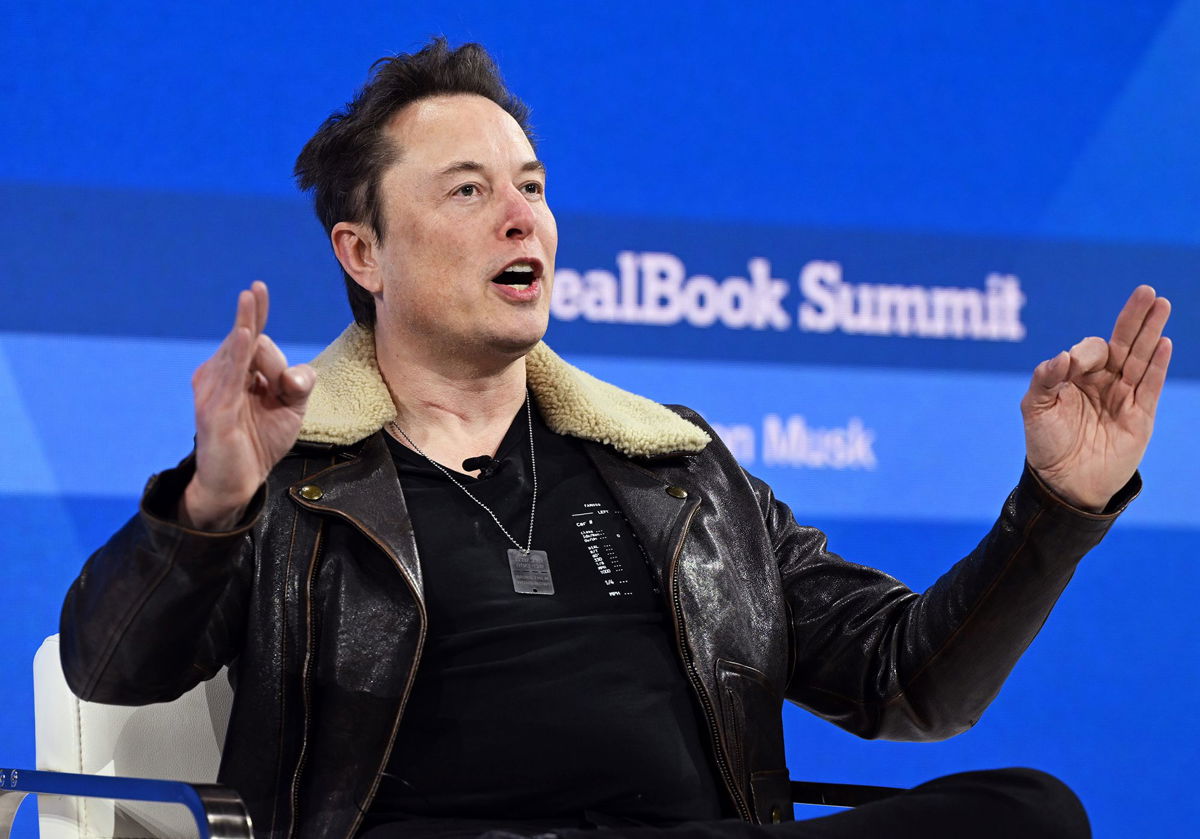 Elon Musk speaks onstage during The New York Times Dealbook Summit 2023 on November 29, in New York City.
