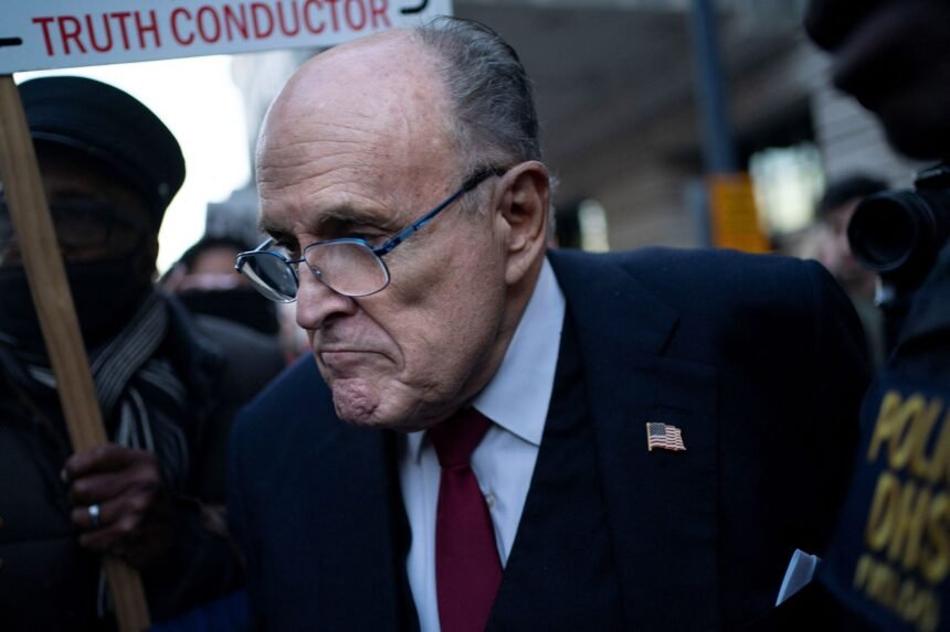 Former New York Mayor Rudy Giuliani departs the U.S. District Courthouse after he was ordered to pay $148 million in his defamation case in Washington