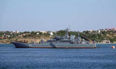 The Russian warship Novocherkassk of the Russian Black Sea Fleet is pictured in front of the port city Sevastopol