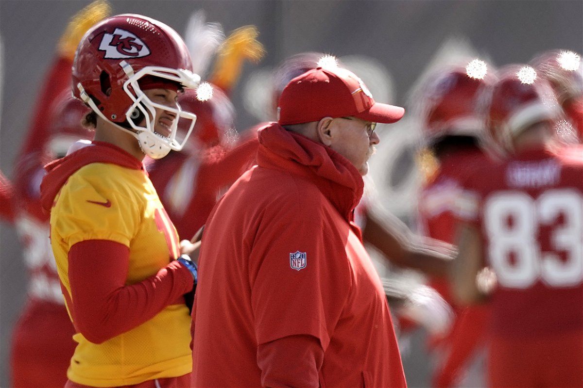 Kansas City Chiefs quarterback Patrick Mahomes, right, and head coach Andy Reid watch practice for Super Bowl 58 Friday, Feb. 9, 2024 in Henderson, Nev. The Chiefs will play the NFL football game against the San Francisco 49ers Sunday in Las Vegas. 
