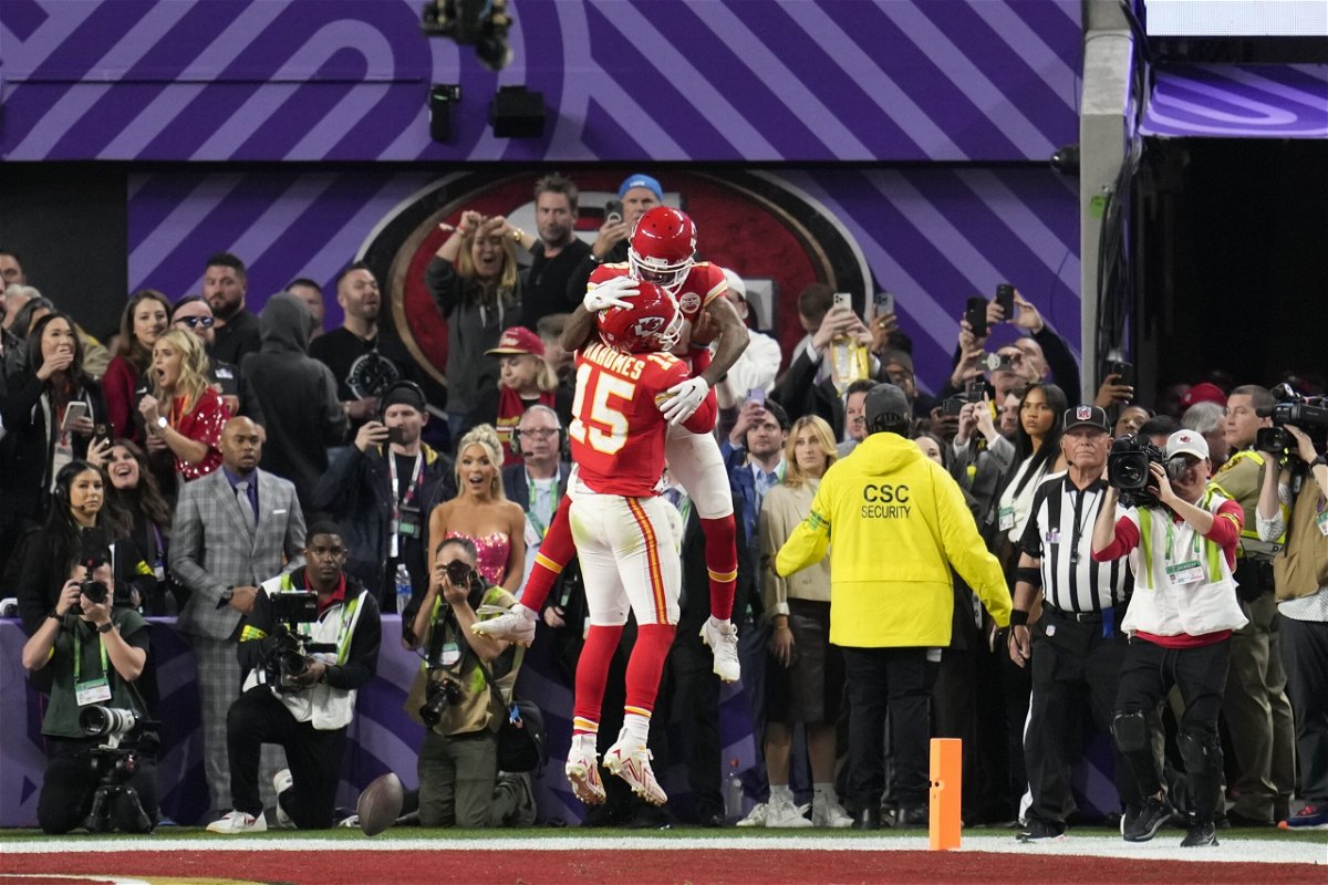 Kansas City Chiefs wide receiver Mecole Hardman Jr. (12) celebrates his game-winning touchdown with quarterback Patrick Mahomes (15) in overtime during the NFL Super Bowl 58 football game against the San Francisco 49ers, Sunday, Feb. 11, 2024, in Las Vegas. The Chiefs won 25-22.