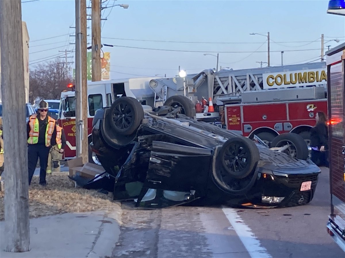 The westbound lanes of Business Loop 70 were shut down on Friday afternoon after a vehicle flipped near the Subway restaurant.