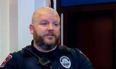 A Mansfield officer says he was just in the right place at the right time when he saved a woman's life last month.