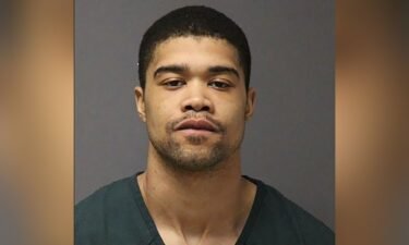 Dion Marsh is seen in a booking photo.