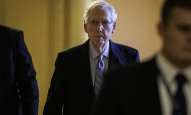 Senate Minority Leader Mitch McConnell (R-KY) heads to the floor of the Senate for a vote on Capitol Hill on February 11 in Washington
