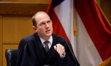 Fulton County Superior Judge Scott McAfee dismisses some counts against Trump