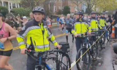 A racially diverse group of runners and spectators who felt police unfairly targeted them along the Boston Marathon running route last year has filed a lawsuit.