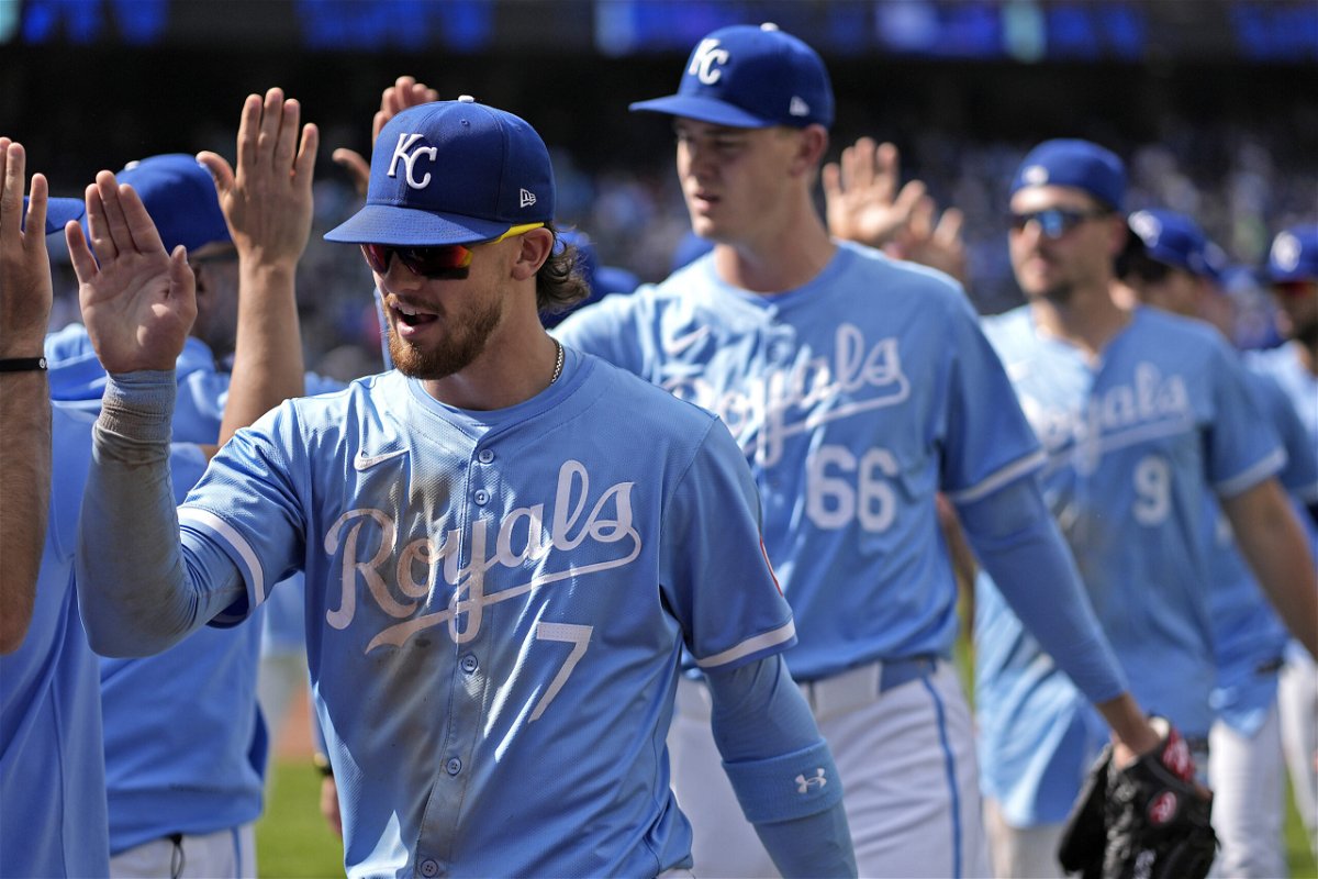 Kansas City Royals' Bobby Witt Jr. (7) celebrates with teammates after their baseball game against the Milwaukee Brewers Wednesday, May 8, 2024, in Kansas City, Mo. The Royals won 6-4. (AP Photo/Charlie Riedel)
