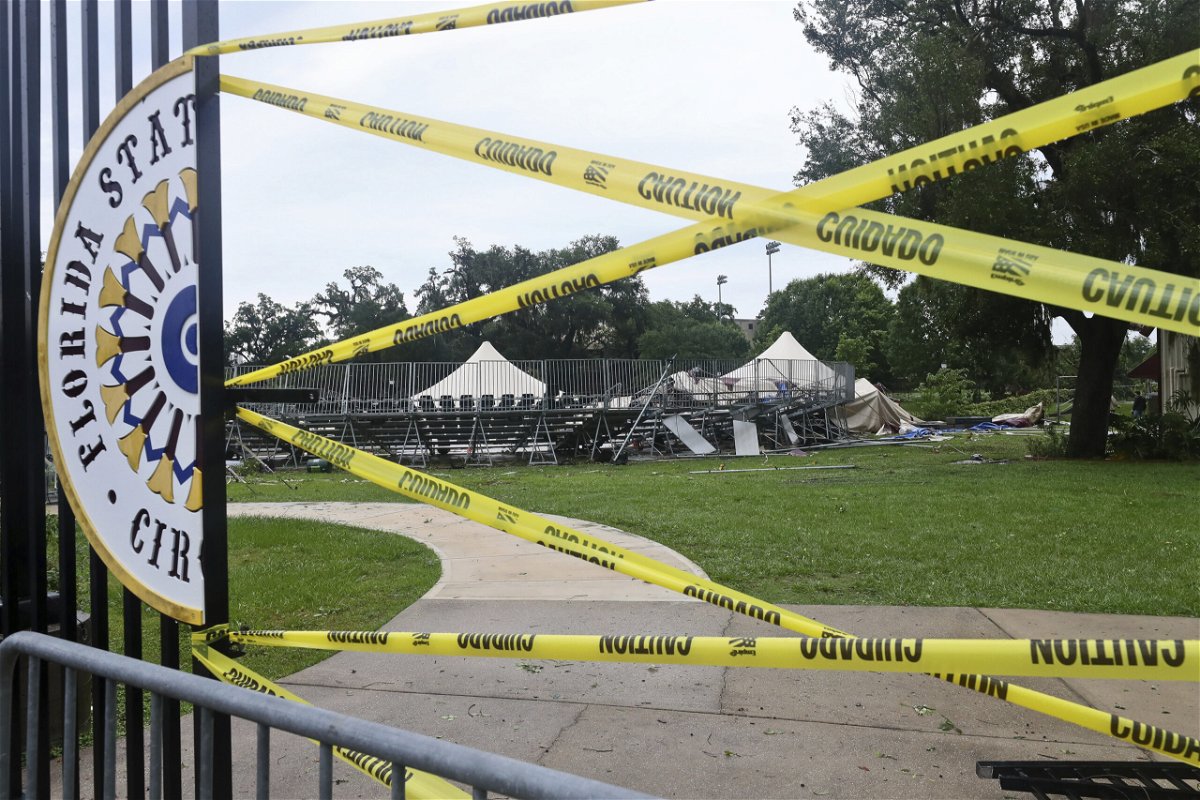 Caution tape blocks the path to Florida State University's Flying Circus bleachers that were damaged when the tent above them collapsed during strong weather in Tallahassee, Friday, May 10, 2024. Powerful storms bringing the threat of tornadoes continued to slam several southern states early Friday, as residents cleared debris from deadly severe weather that produced twisters in Michigan, Tennessee and other states. Some of the strongest storms early Friday rolled into Tallahassee. 
