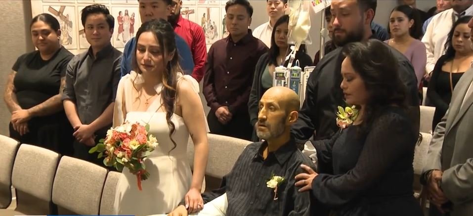 <i>KCAL/KCBS via CNN Newsource</i><br/>An Orange County couple held a heartfelt wedding ceremony inside a hospital chapel so the bride's father
