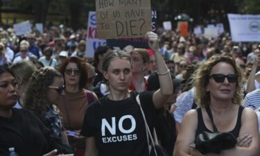 Demonstrators take part in a national rally against violence against women in Sydney on April 27.
