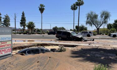 Officials are investigating a crash that led to a flooded sinkhole