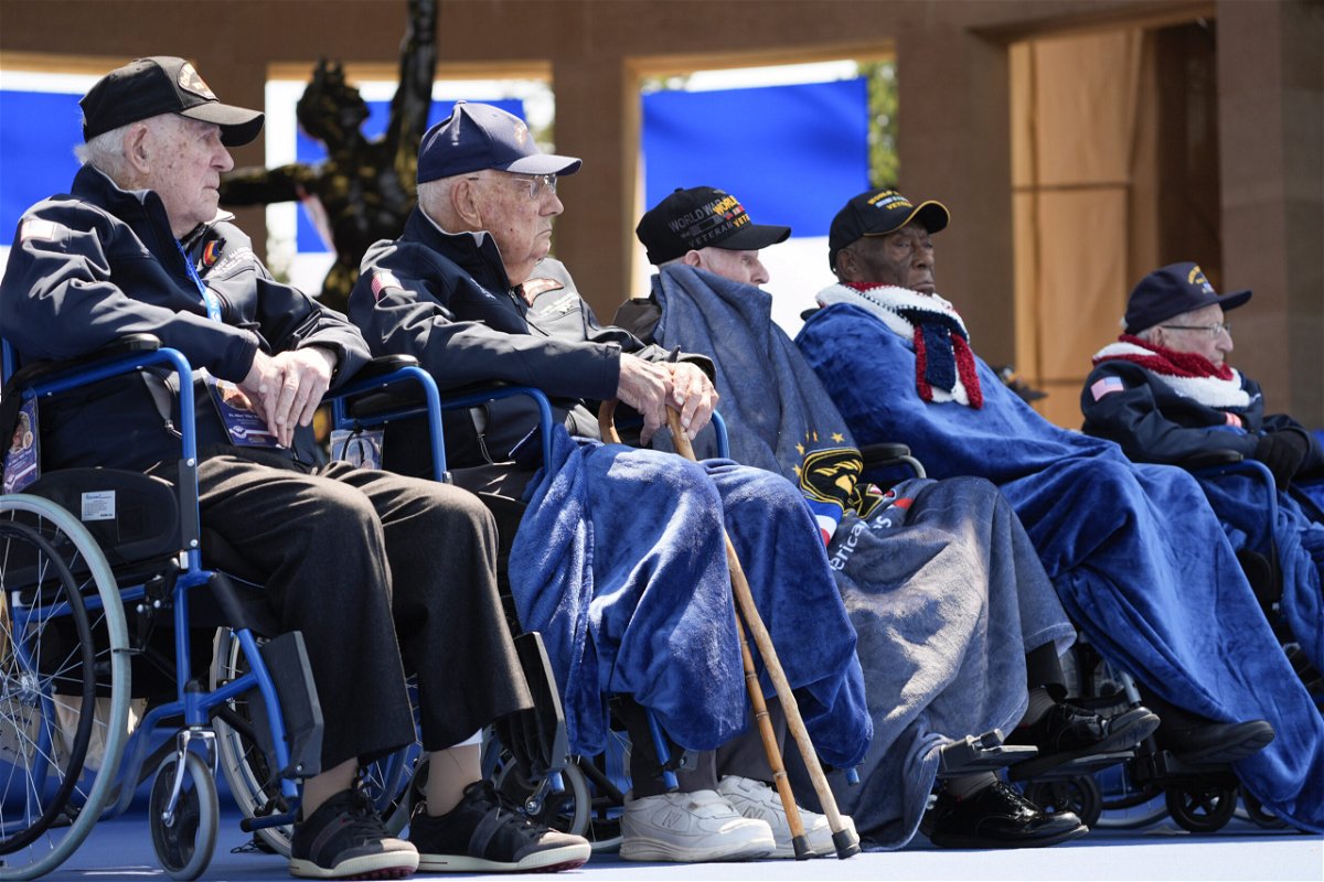 World War II veterans listen during a ceremony to mark the 80th anniversary of D-Day, Thursday, June 6, 2024, in Normandy. 