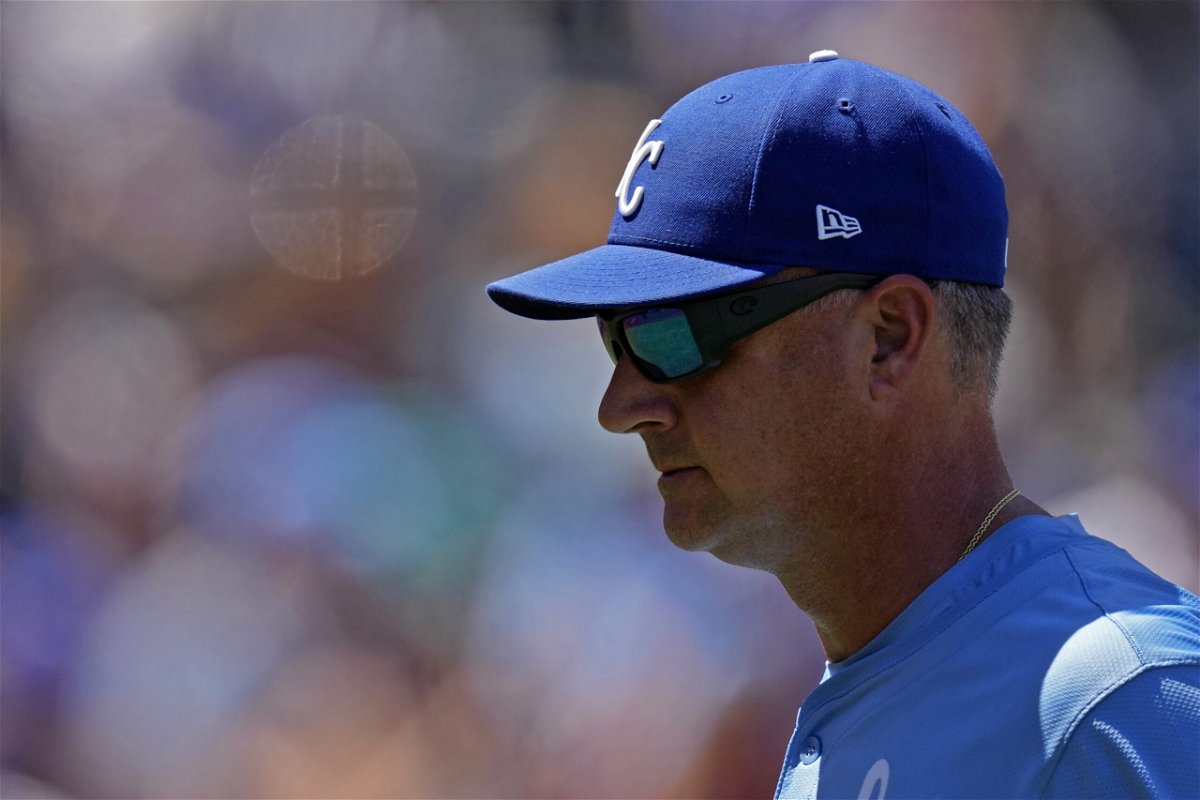 Kansas City Royals manager Matt Quatraro walks back, to the dugout after making a pitching change during the seventh inning of a baseball game against the Seattle Mariners Sunday, June 9, 2024, in Kansas City, Mo. (AP Photo/Charlie Riedel)