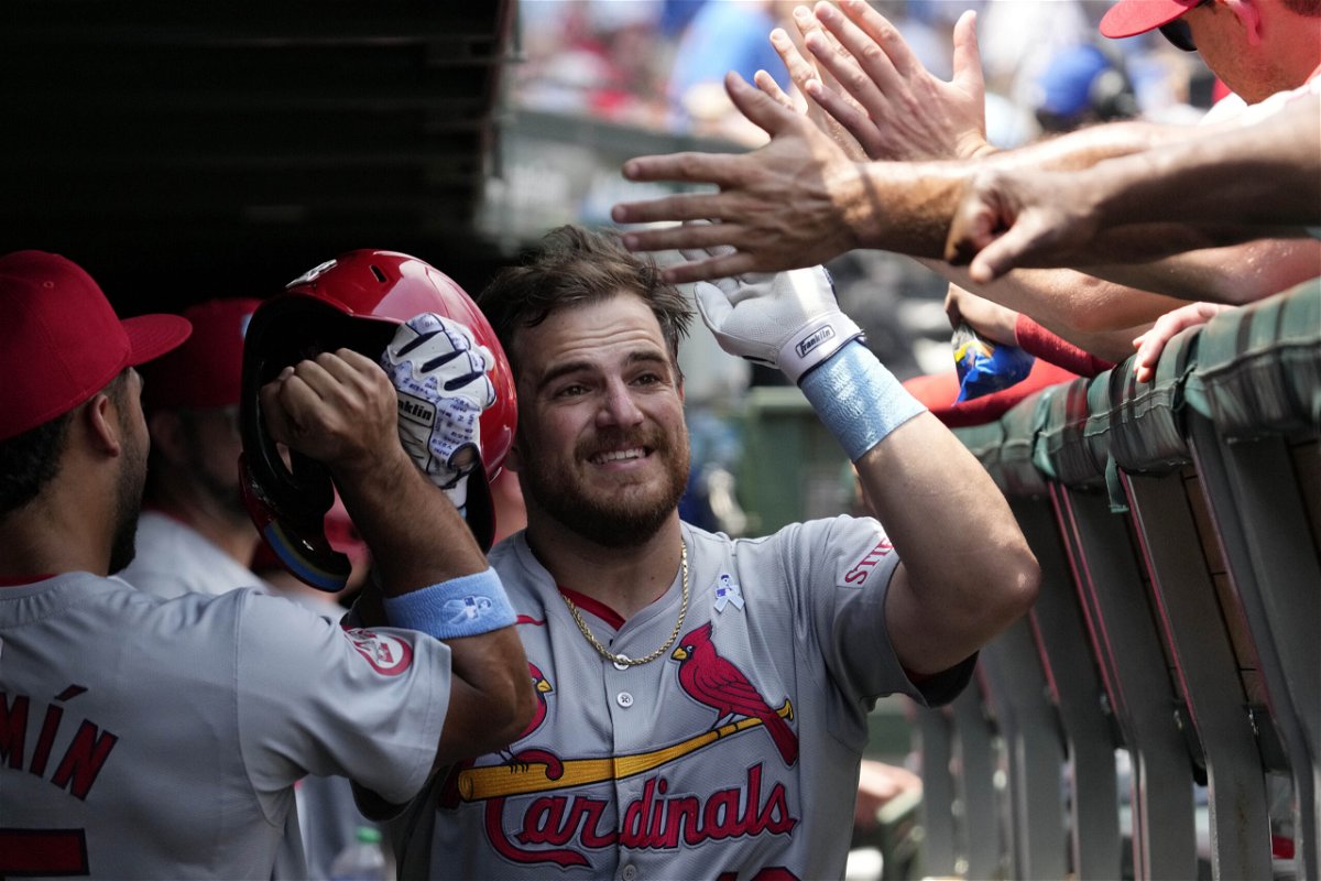 St. Louis Cardinals starting catcher Pedro Pagés celebrates with teammates after hitting a two-run home run during the second inning of a baseball game against the Chicago Cubs in Chicago, Sunday, June 16, 2024. 