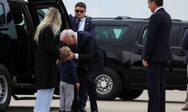 President Joe Biden embraces his grandson Beau Biden as his daughter-in-law
