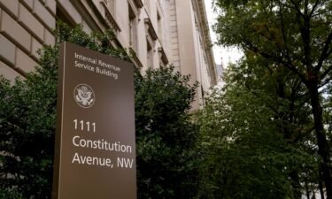 This September 2020 photo shows a sign for the Internal Revenue Service building in Washington