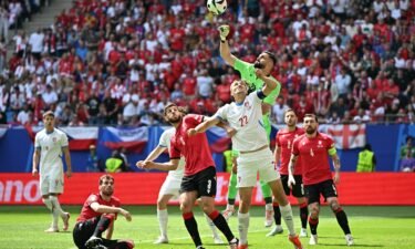 Georgia's goalkeeper Giorgi Mamardashvili punches the ball against Czech Republic in the two team's Group F game at Euro 2024.