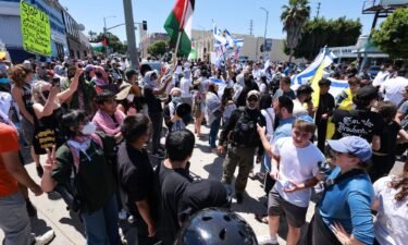 Supporters of Israel clashed with pro-Palestinian protesters in front of the Adas Torah synagogue
