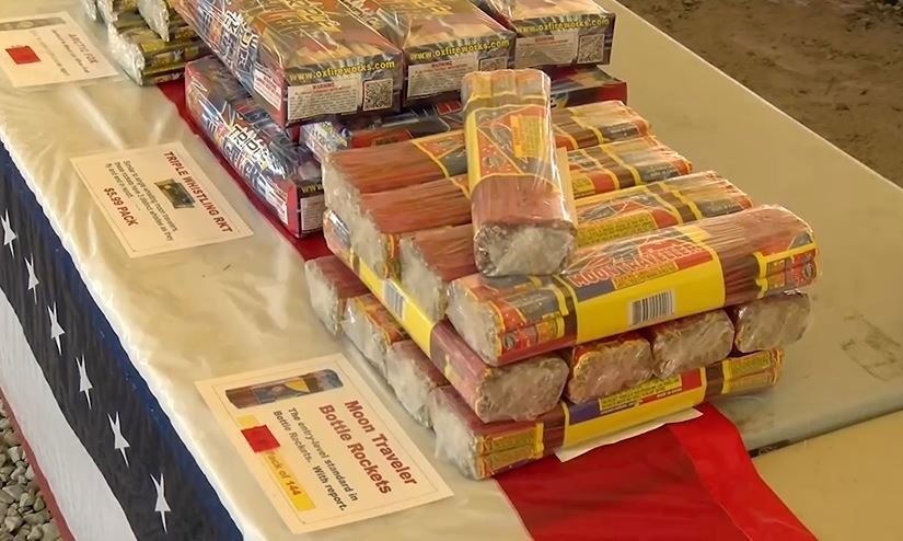 FILE - Bottle rockets for sale at a fireworks tent outside Columbia.