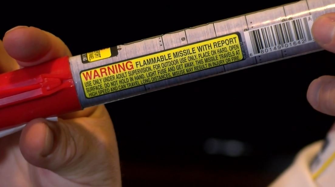 FILE -- A warning label printed on a firework.